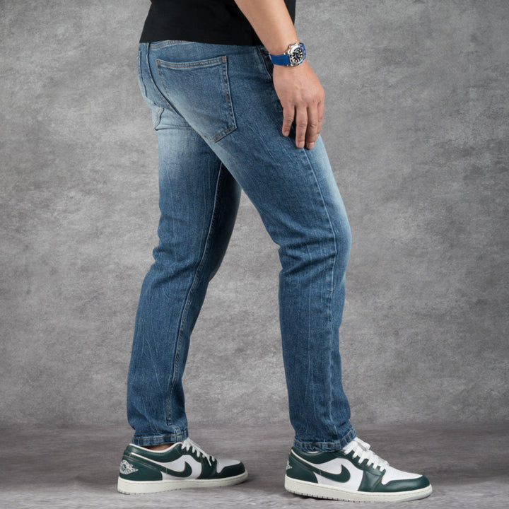 5' 8" short men wearing perfect fit washerd blue jeans. 
